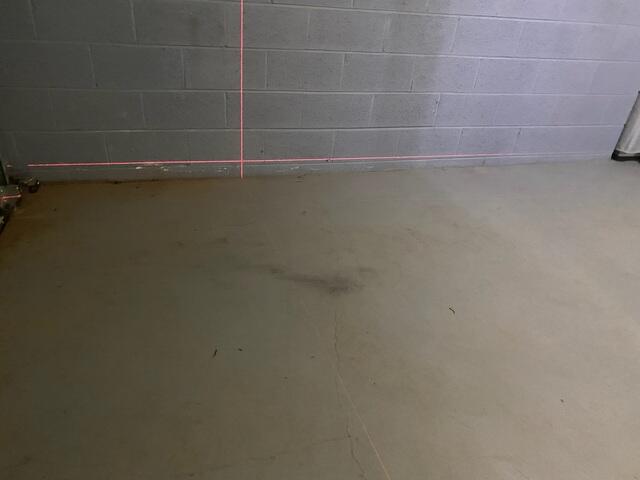 Identifying the Problem: Interior Slab Cracks and Settlement