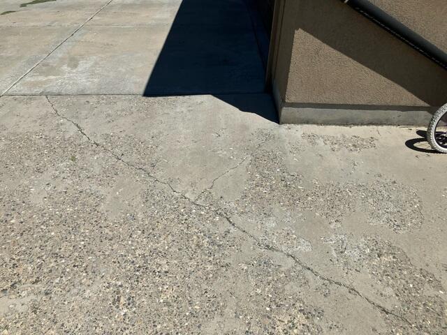 Concrete Driveway crack with Spalling