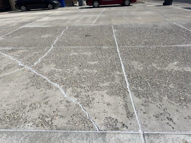 After concrete driveway repair job is finished