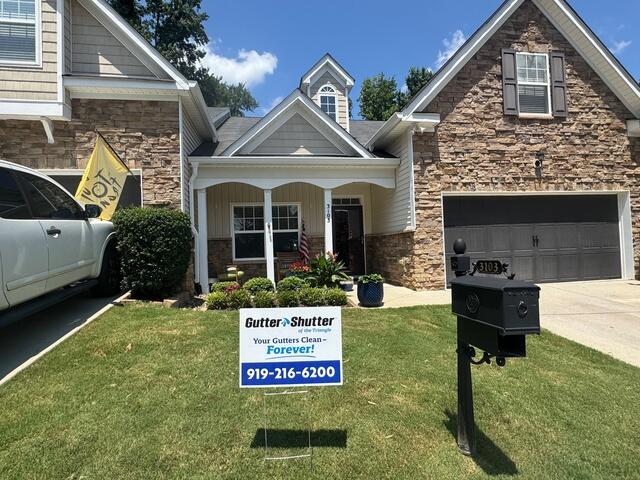 Front of home after gutter and Rain Drop installation