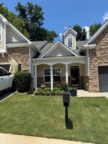 Front of home after gutter and Rain Drop installation
