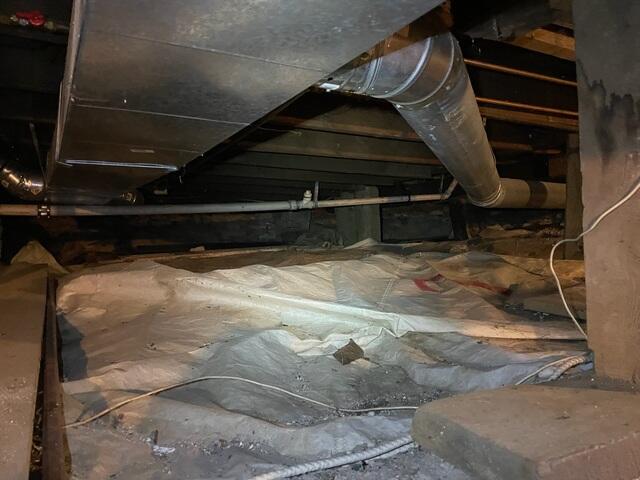 Unsealed Crawl Space with Minimal Moisture Protection