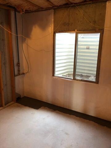 Basement Wall with Moisture Barrier Installed