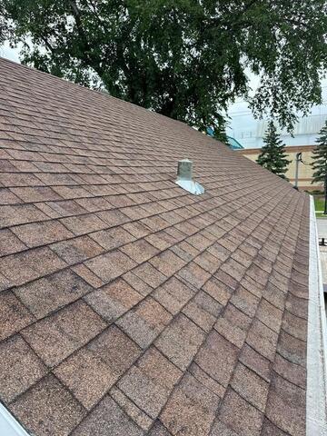 Wind & Rain Roofing Shingle damage