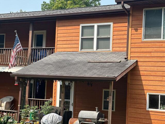 Lifted shingles nailed down