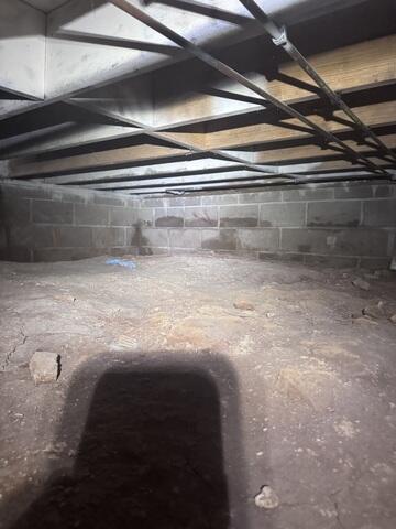 Dirty and Damp Crawl Space
