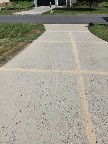 Driveway After Crack Repair - Restored Surface in Asheboro, NC
