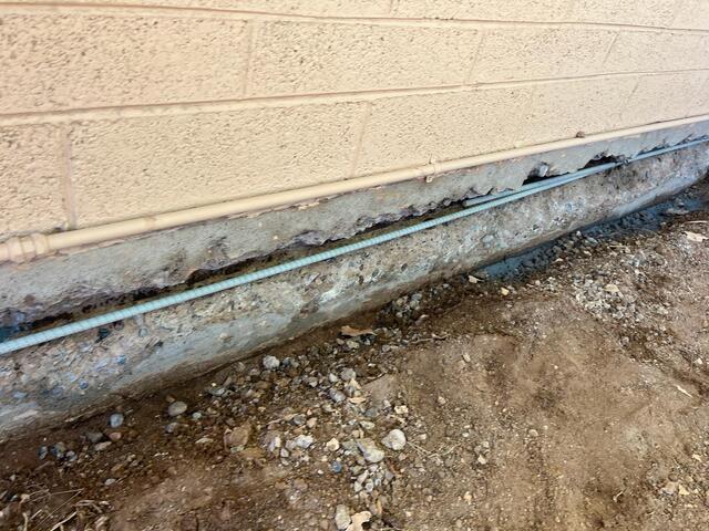 Rebar replaced, then rust inhibitor - stem wall foundation