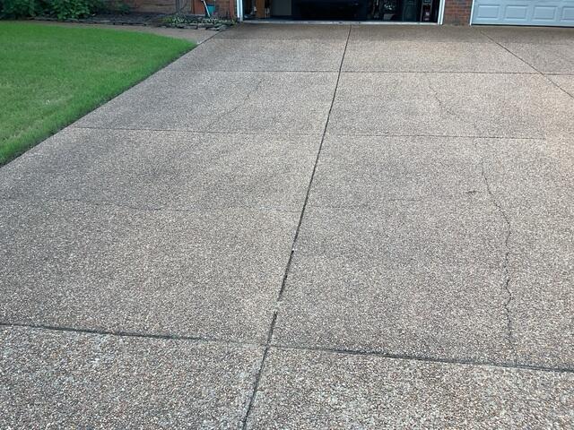 Concrete Driveway Cracked and Sinking