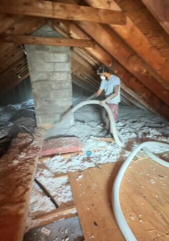 Working to Insulate the Attic