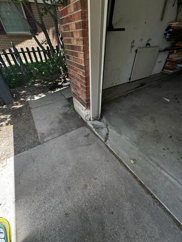 Driveway Crack at Garage Entry in Salt Lake City