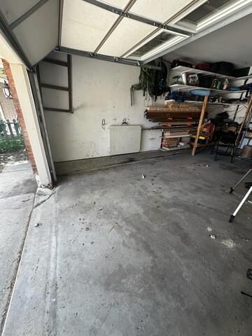 Settled Driveway Slab Before PolyLevel® Repair