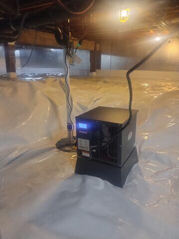 A Covered, State-of-the-Art Sump Pump with SaniDry© Sedona, A Top Performing Dehumidifier In The Market