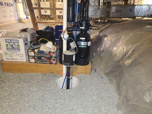Before We Fixed It: A Risky, Open Air Sump Pump With Exposed Surrounding Gravel