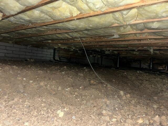 Before Crawlspace Encapsulation - Exposed Dirt Floor in Prescott, AZ