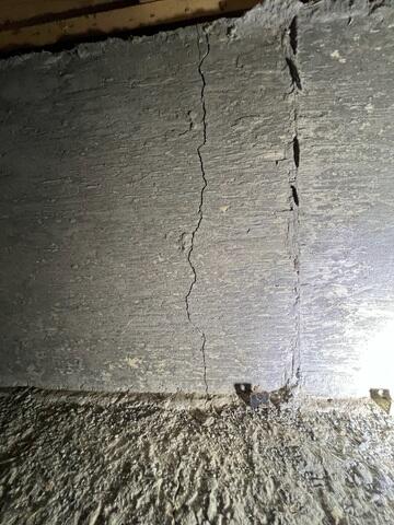 A cracking, settling home foundation.
