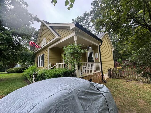 Side of home after Gutter Shutter installation