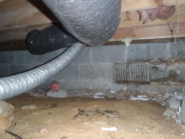 This photo captures what the crawl space looked like before the encapsulation process began. This homeowner's crawl space was moldy to the vents located in their crawl space. 