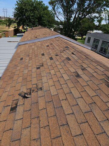 Lifting Shingles on the home.