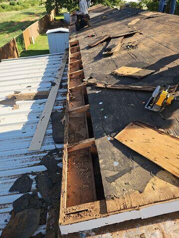 Rotting decking boards.