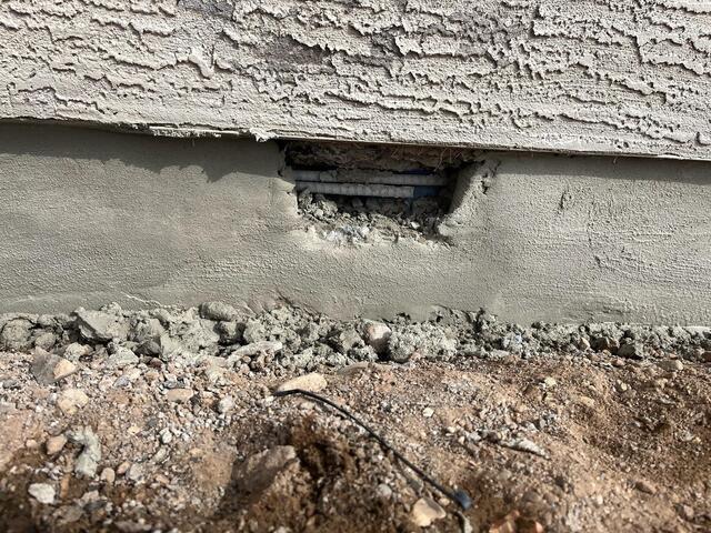 Halfway application of fresh cement - stemwall (During)