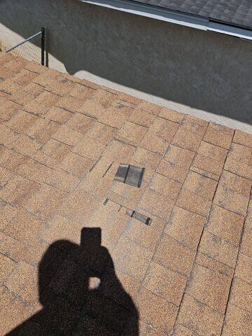 Shingles Blown off.
