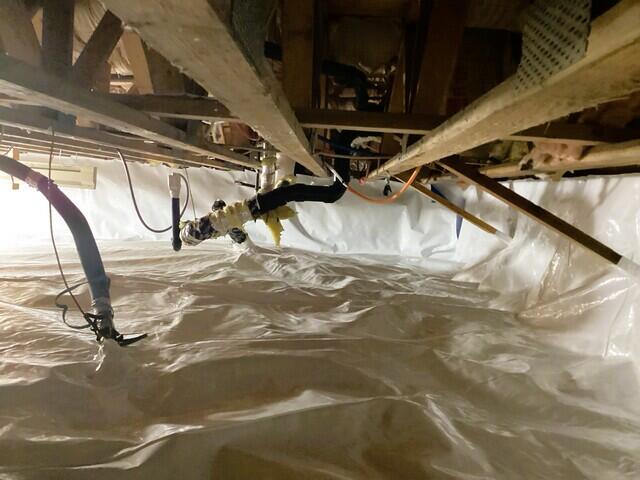 CleanSpace© Installed Around Wooden Supports And Plumbing