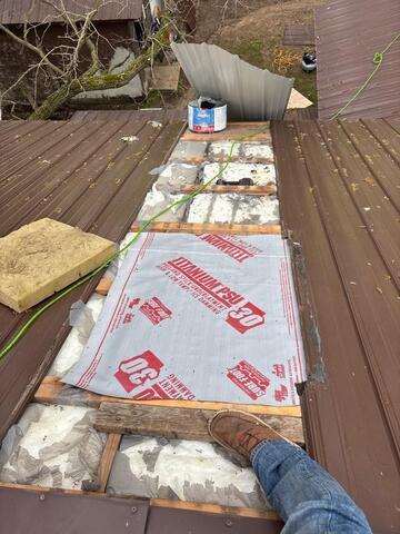 Pleacing the metal roofing