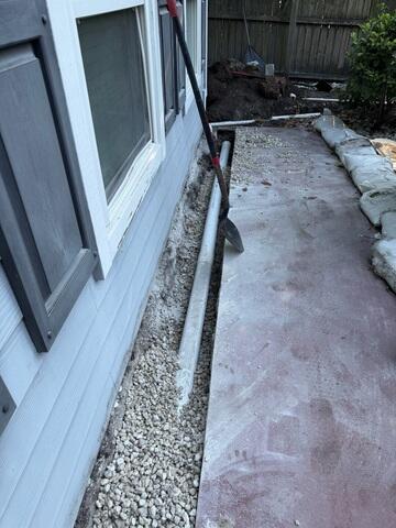 Foundation Drainage Line Installation Beside Home - Jacksonville, FL