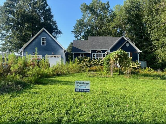Front of home after Gutter Shutter installation
