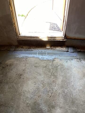 TrenchDrain Basement Surface Drainage System