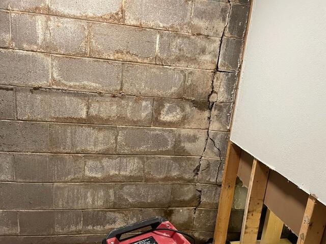 Damaged Wall Before Repairs