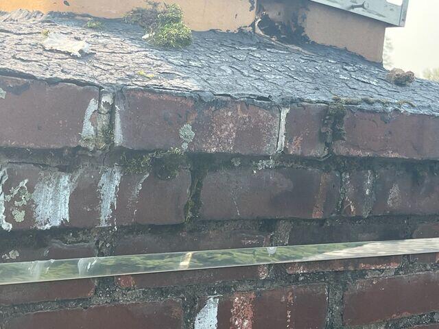 Damaged Chimney Brick and Flashing