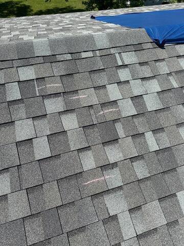 Marking the damaged shingles