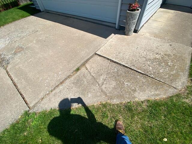 Sunken corner of driveway