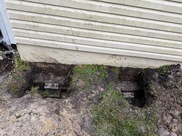 Installing Helical Piers for Foundation Support