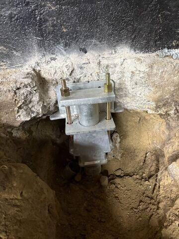 Push Piers Secured to Footing