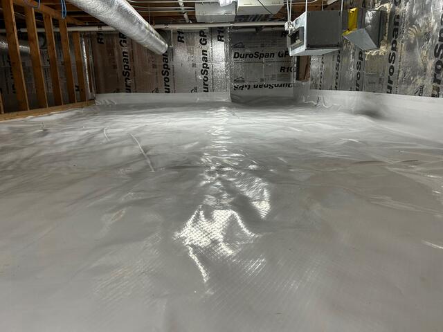 CleanSpace liner installed on floor, insulation installed on walls