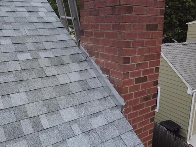 New Flashing Is Installed on the Chimney