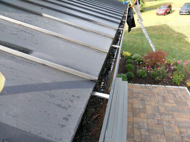 Removing debris from gutters