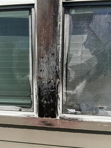 A lightning strike directly into the window frame