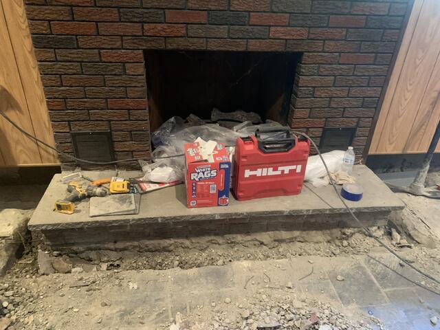 Jackhammering in Front of The Fireplace
