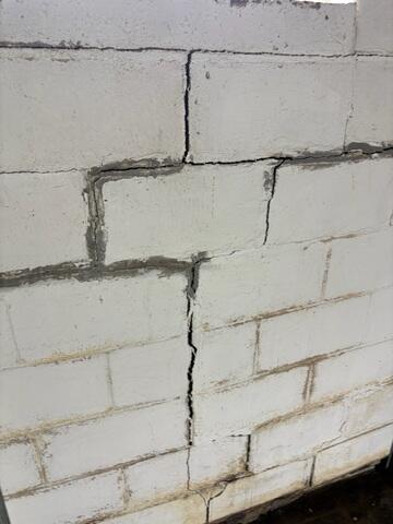 Strength for Stressed Walls