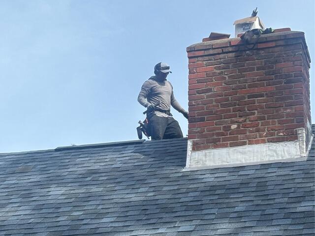 New Flashing Is Installed on the Chimney