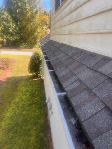 Side of home before Rain Drop installation