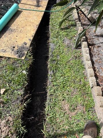 Excavating Drainage Pipe Trench