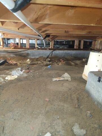 Dirty Crawl Space Before Installation