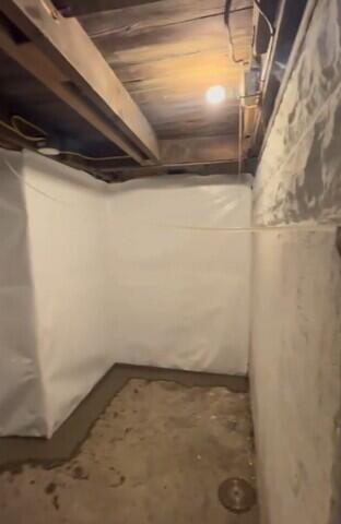 Vapor Barrier and Drainage System Installed