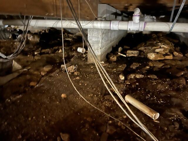 Dark, Wet Crawl Space