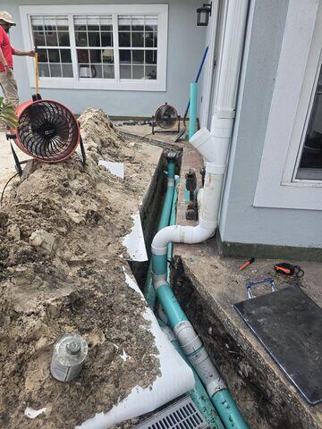 Subsurface Downspout Connection